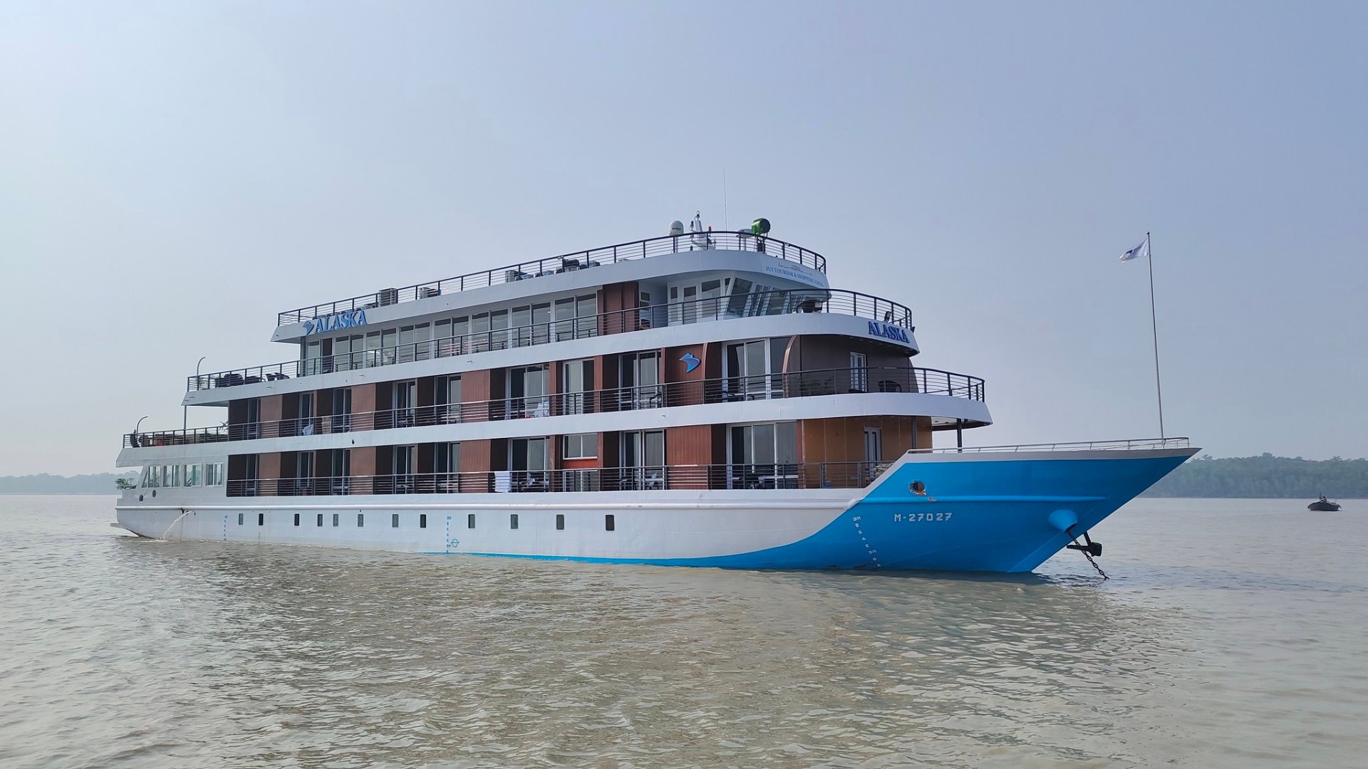 Luxury cruise ship Alaska sailing through Sundarban waterways