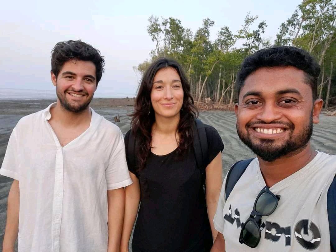 Foreign tourist experiencing local culture and traditional attire with guide Al Amin in Sundarban