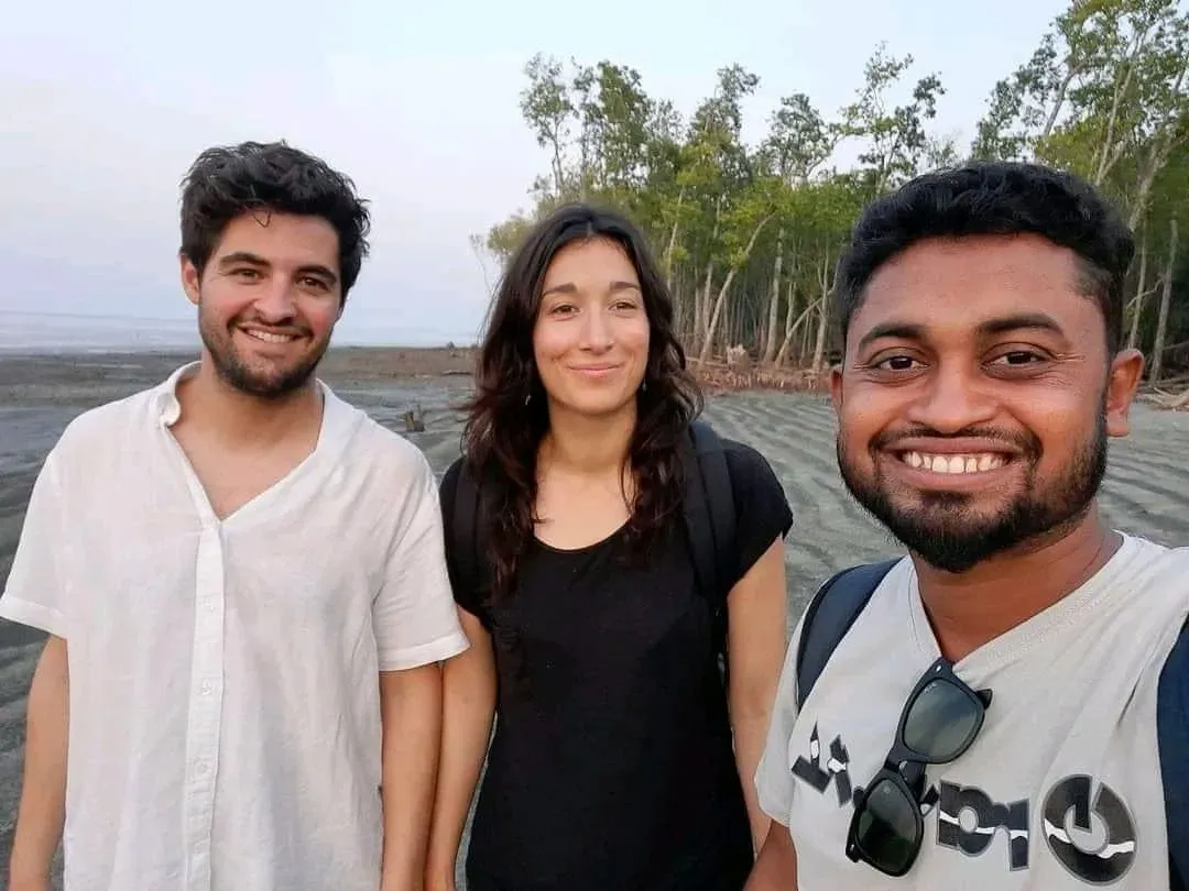 Foreign tourist experiencing local culture and traditional attire with guide Al Amin in Sundarban