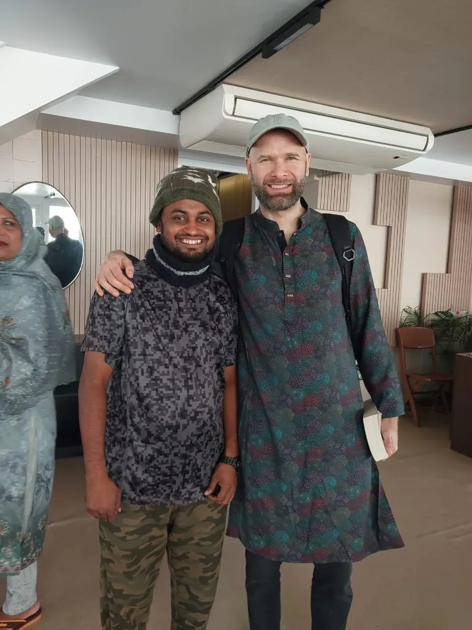 International guest enjoying the view from a Sundarban cruise ship deck with Al Amin